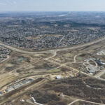 The SWCRR alignment down the west side of Woodbine, with the KGL site office and Tsuut'ina Nation Admin Building (looking southeast)