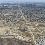 Earthworks for the Anderson Road system interchange, as well as the KGL site office and Tsuut'ina Nation Admin Building (looking east)