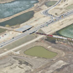 The new westbound Highway 22X bridge over the CP Railway line leaving the Macleod Trail interchange (looking northeast)