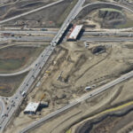 Earthworks and bridge construction for the future westbound alignment at Highway 22X and Macleod Trail (looking west)