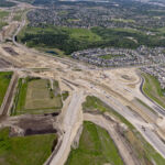 Earthworks and bridge construction for the road alignment near the intersection of 37 Street, 146 Avenue and Fish Creek Boulevard (looking north)