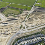 Construction at Fish Creek Boulevard, including the new ramp across to access 37 Street (looking southwest)