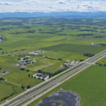 New lanes in the median of Highway 22X stretching to the west end of the project (looking southwest)