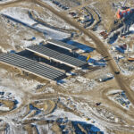 Three bridges with girders, as well as the piers for a fourth bridge in the Sarcee Trail Interchange (looking northwest)
